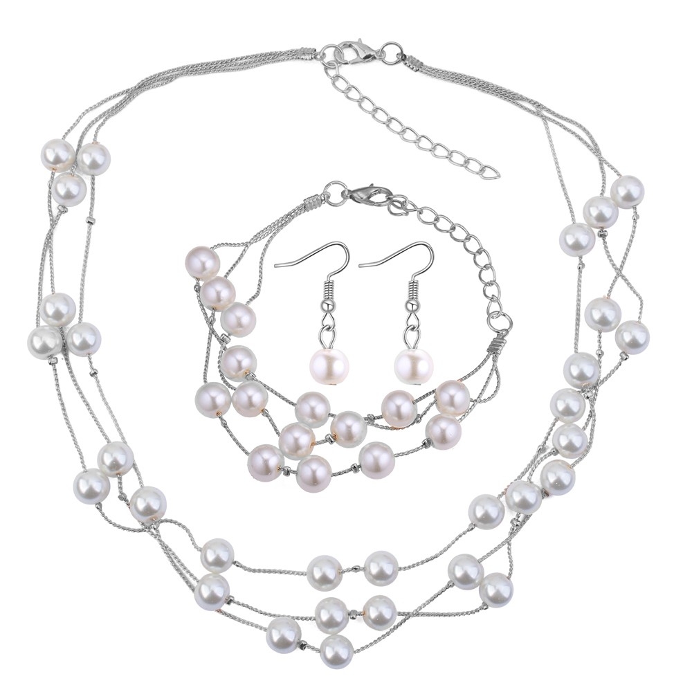 Smyckesset i Silver Färg med Vita Pärlor på Kedjor - Halsband, Armband & Örhängen